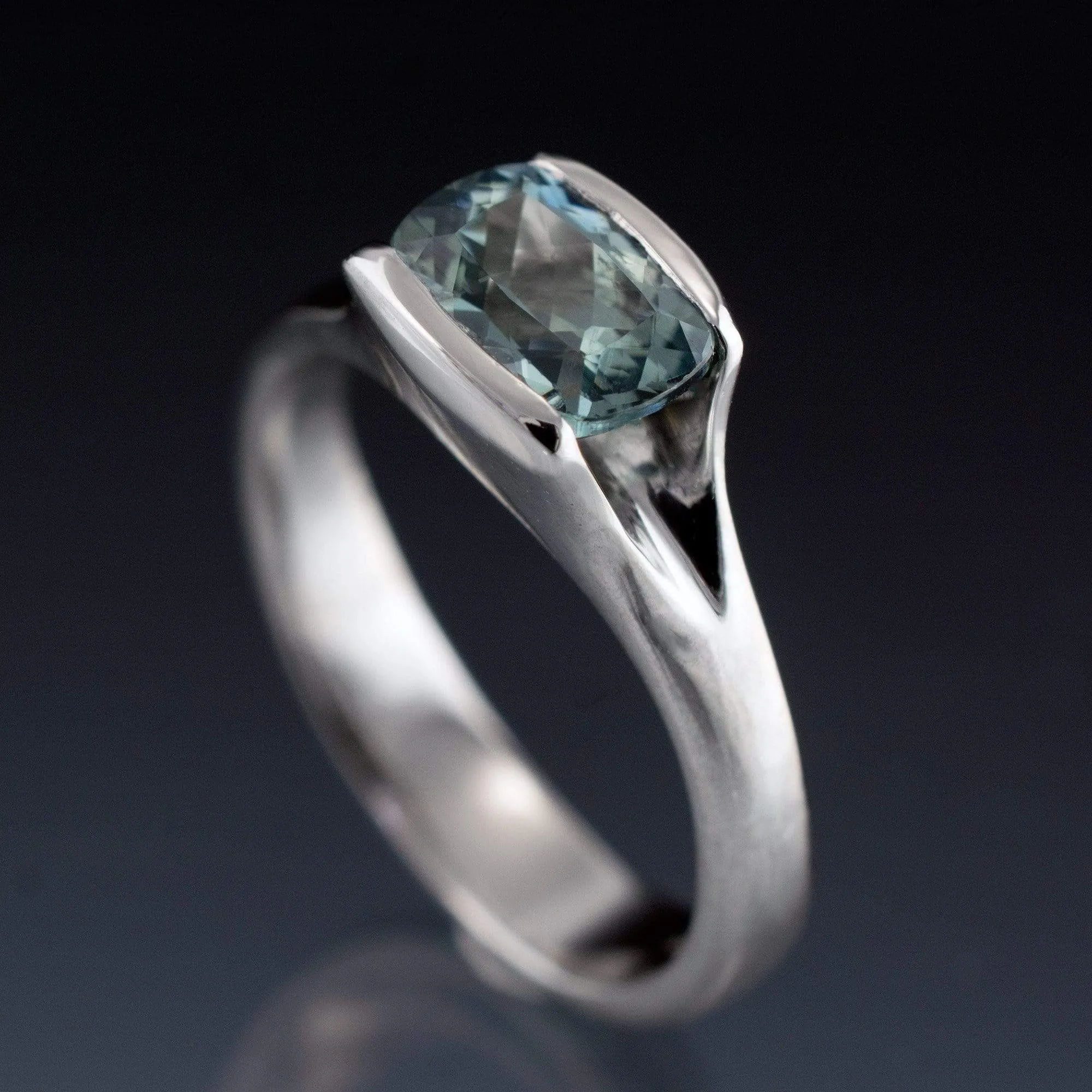 Cushion Fair Trade Teal Sapphire Fold Solitaire Engagement Ring